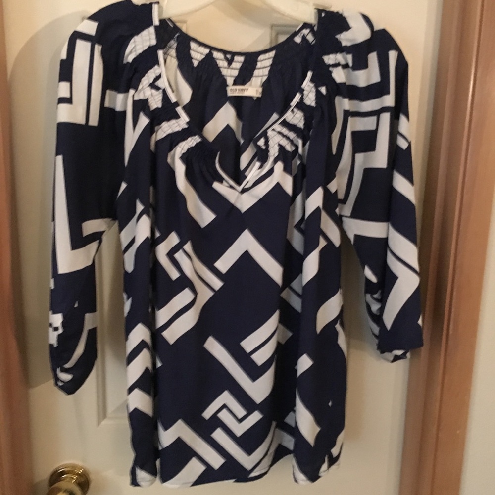 Dressy top with split smocked neckline